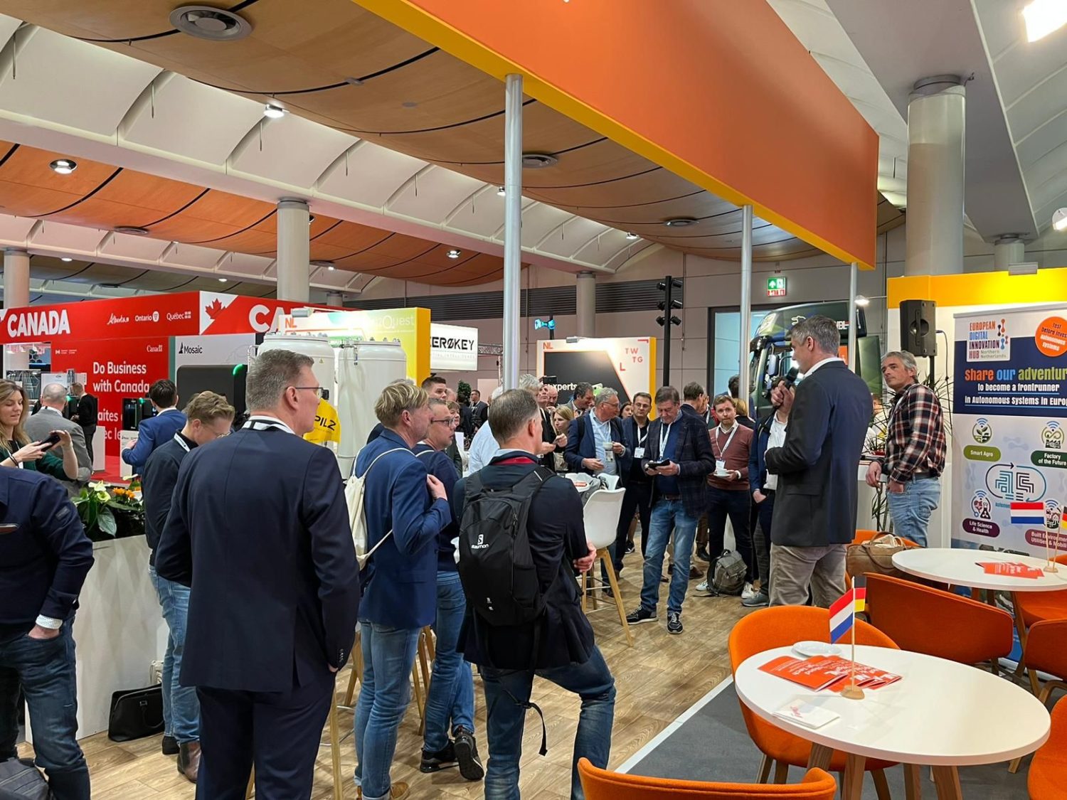 Group of entrepreneurs watches a presentation at Hannover Messe
